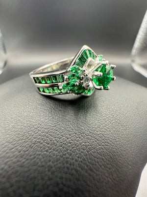 silver woman ring with green