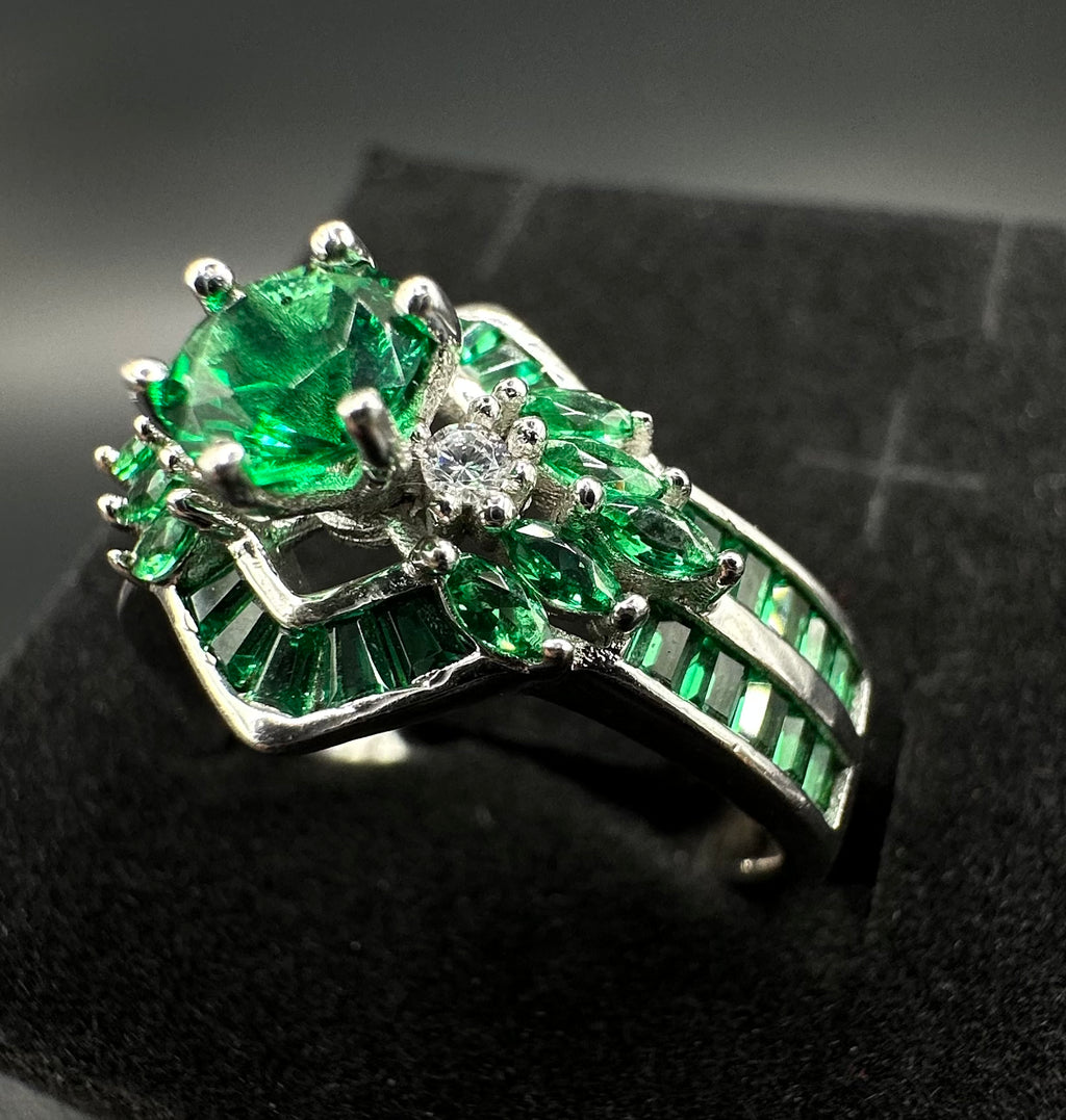 silver woman ring with green