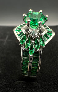 silver woman ring with green